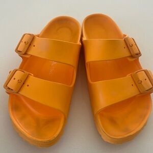 Birkenstock orange rubber sandals
